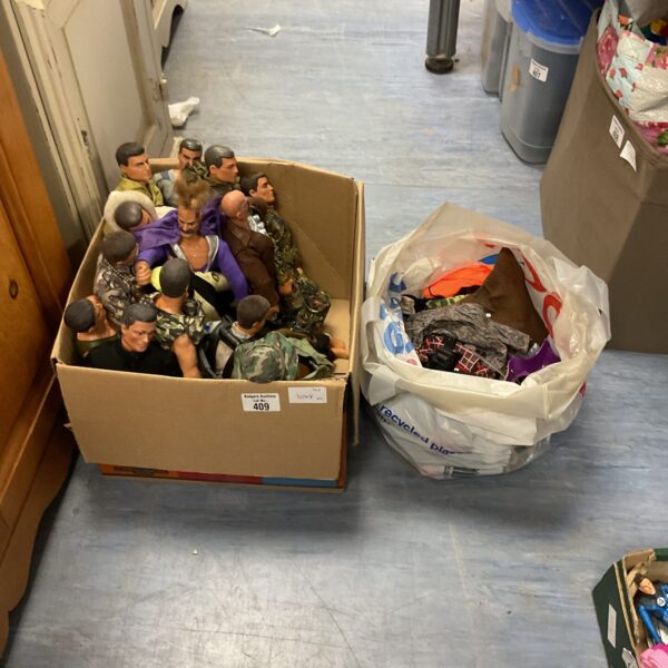 Box of retro hasbro action man figures and accessories .