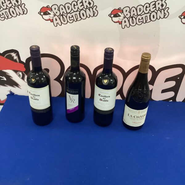 Four bottles of wine inc Hardys Merlot