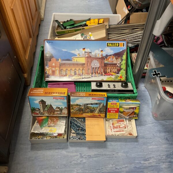 Two boxes of mixed vintage model train items inc boxed model kits, tracks, carriages and twin power supply unit