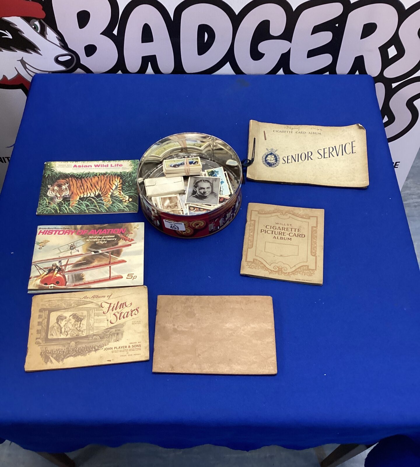 Tin of cigarette cards & cigarette card albums