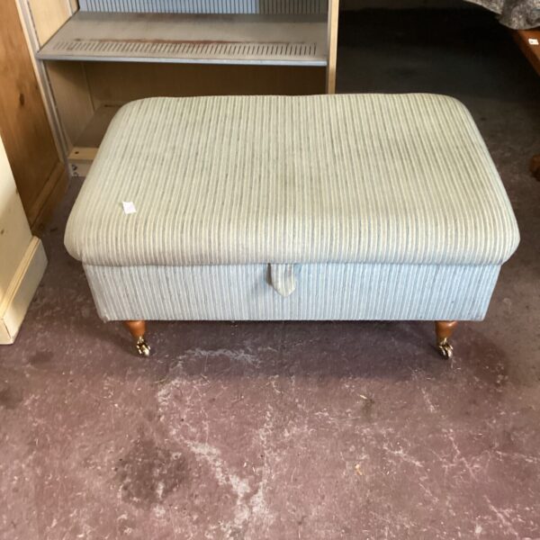 Castor legged footstool/Ottoman