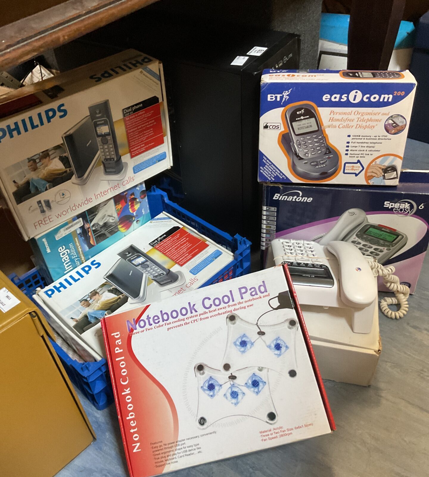 Lot of mixed household electronics including philips home phone & notebook cool pad