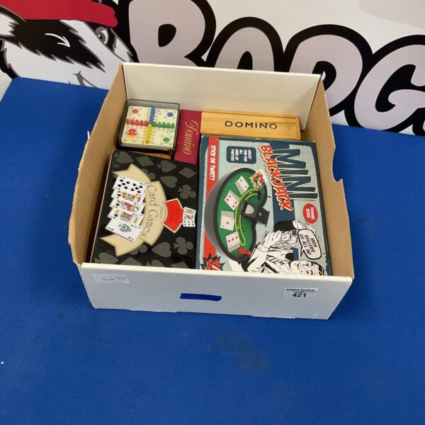 Box of board games inc dominos and cards