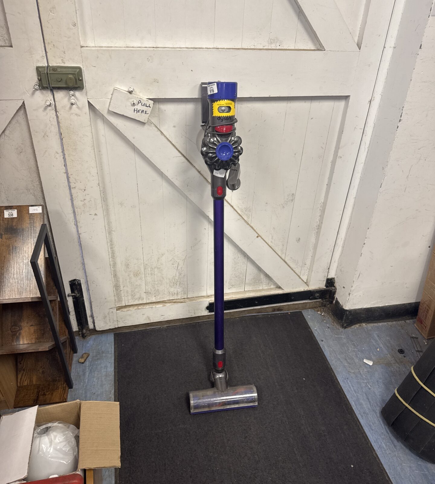 Dyson cordless hoover with charger - powers on