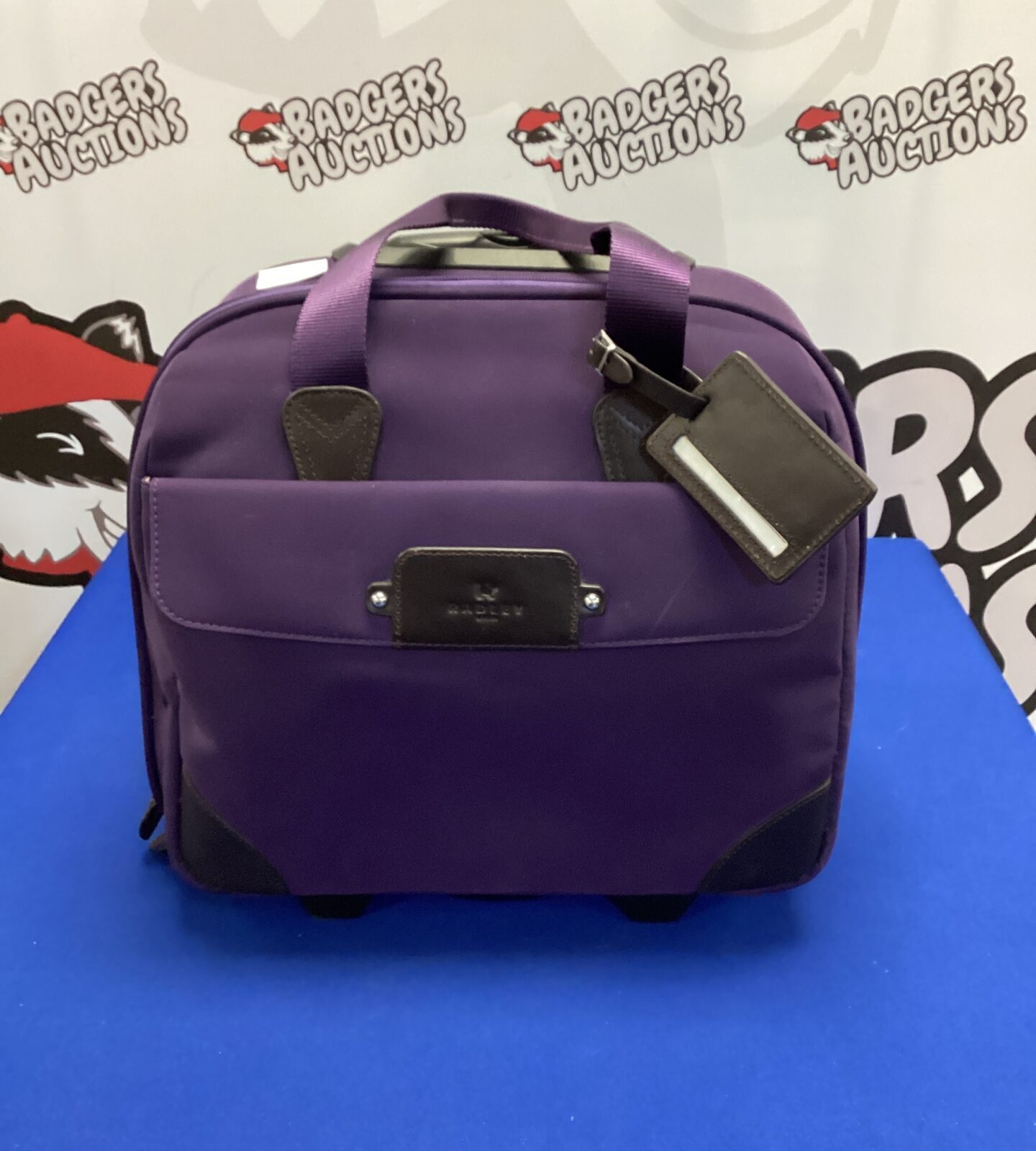 Purple radley travel bag with wheels & extendable handle