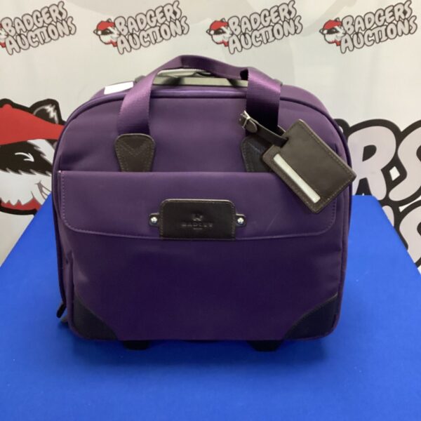 Purple radley travel bag with wheels & extendable handle
