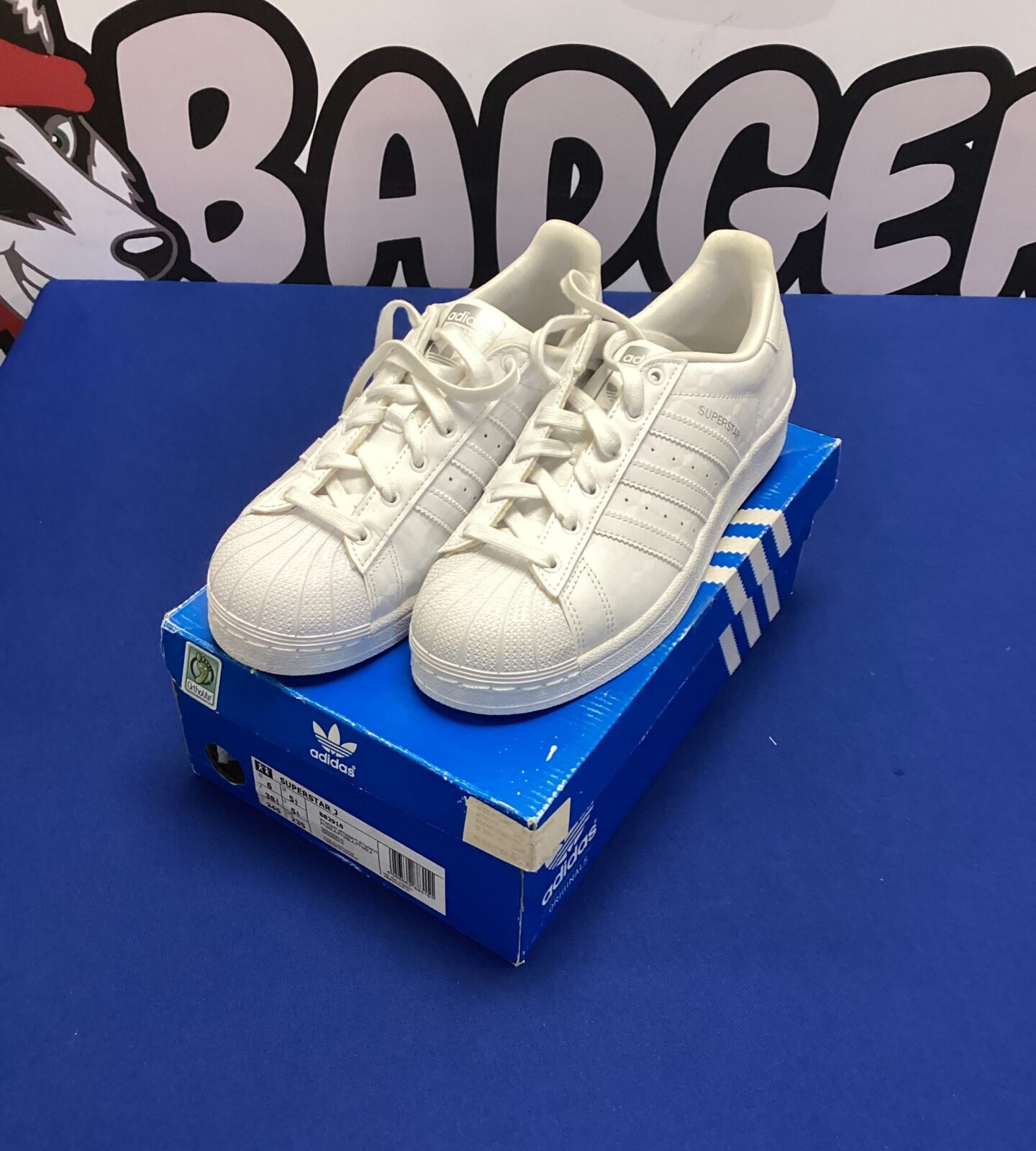 Pair of size 5.5 adidas superstar J trainers