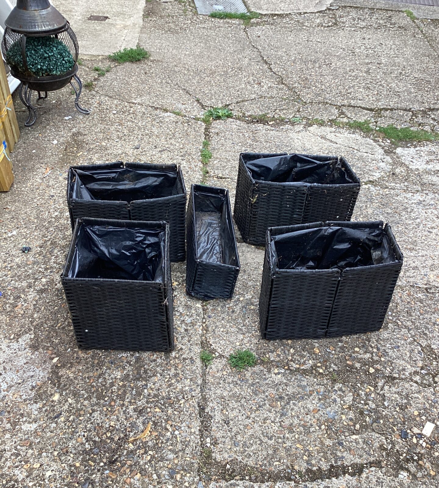 Five folding raffia effect garden planters
