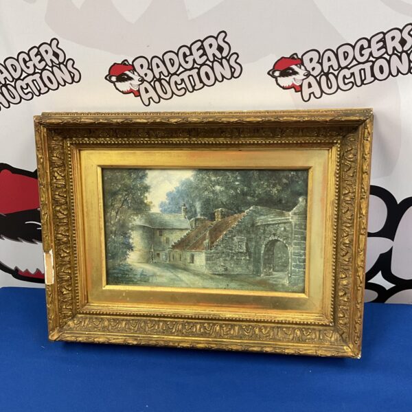 Signed 19th century gilt framed watercolour of a castle gate house
