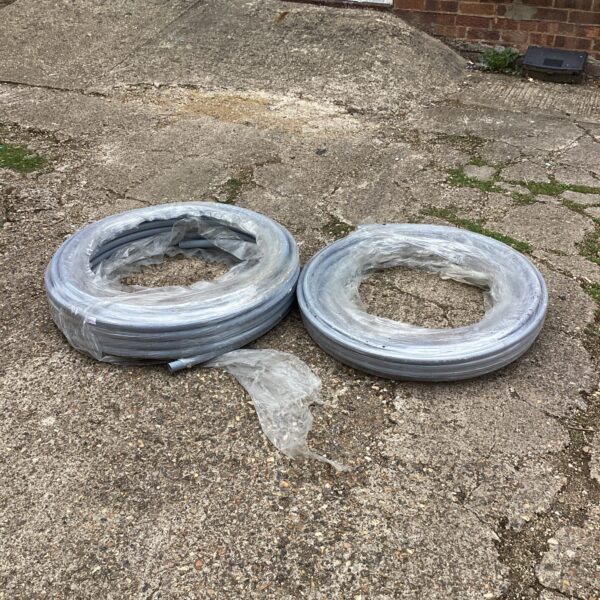 Two rolls of plastic 22mm pipe