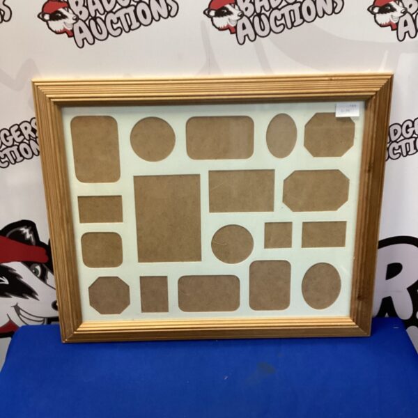Vintage wooden picture frame for displaying photos or artwork.
