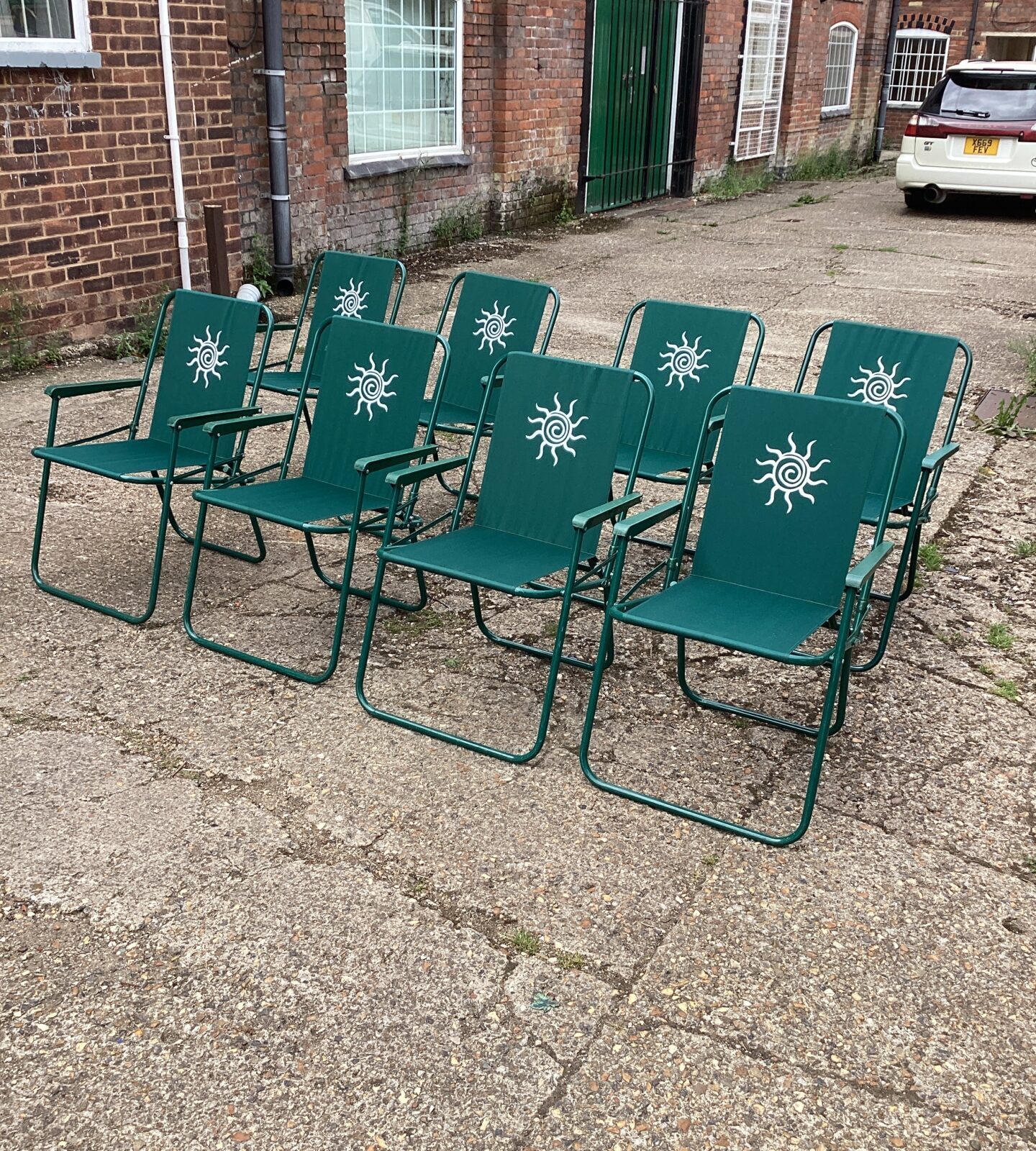 Eight Folding Garden Chairs