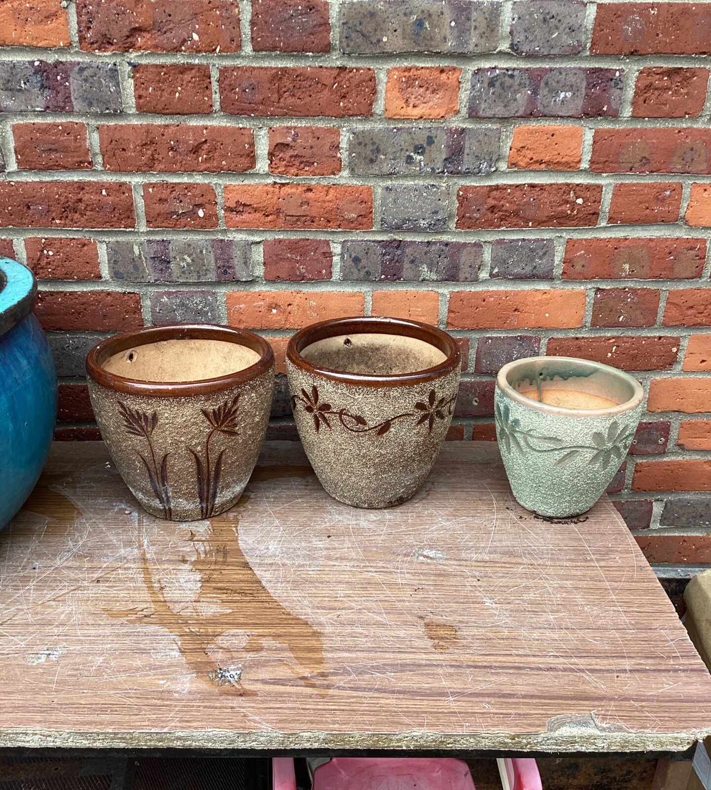Three decorative garden pots