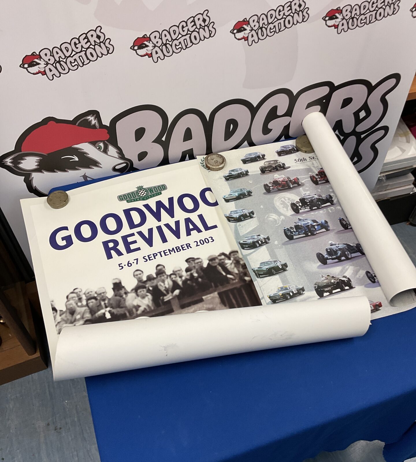 Two motor racing posters including goodwood revival