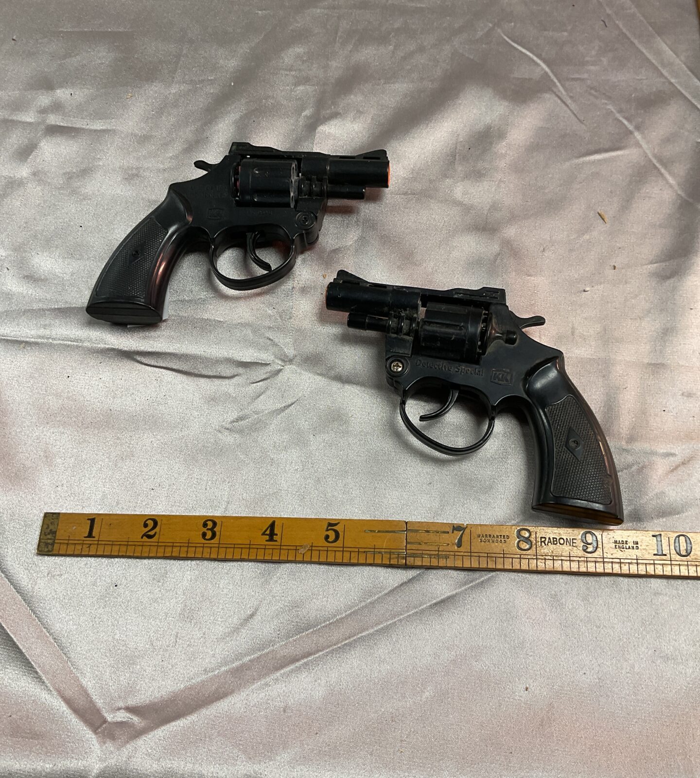 Two vintage detective special toy cap guns