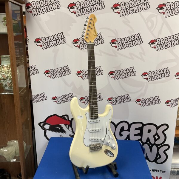 White encore blaster series electric guitar