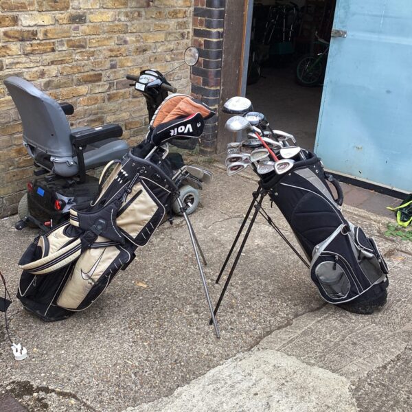 Large quantity of golf clubs and Two Stand Bags