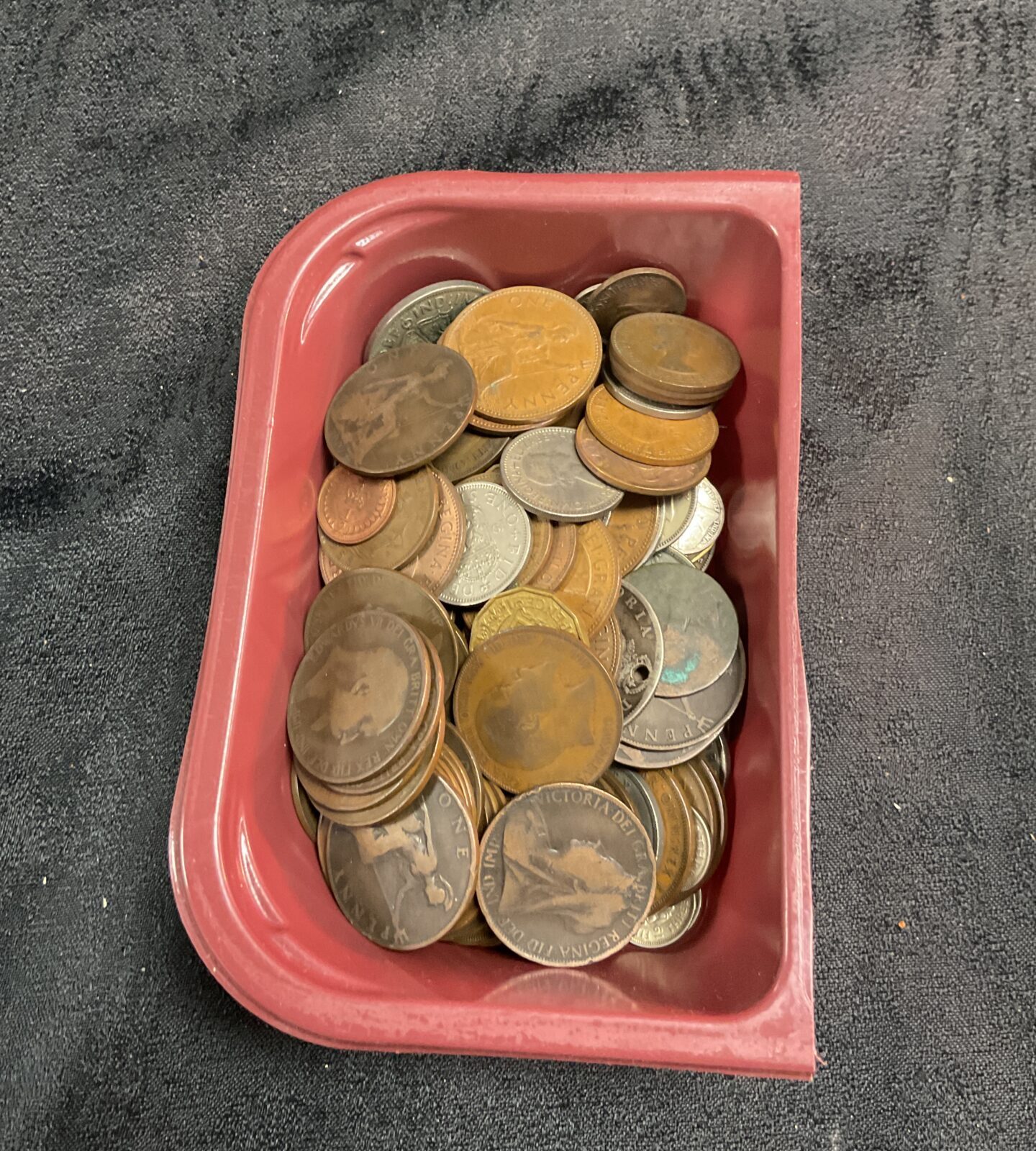 Tub of mixed coins