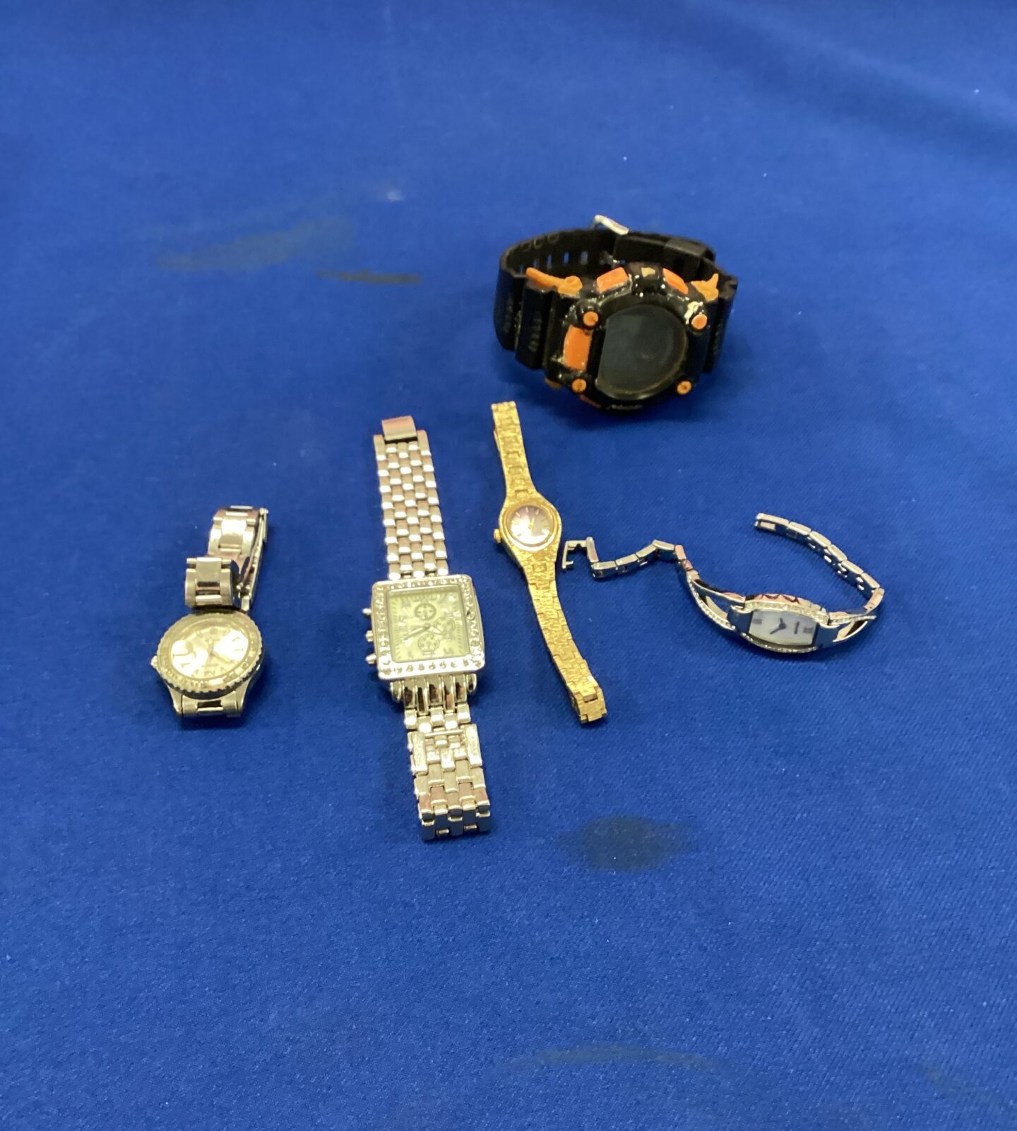 Tub of five assorted wrist watches inc coolboss