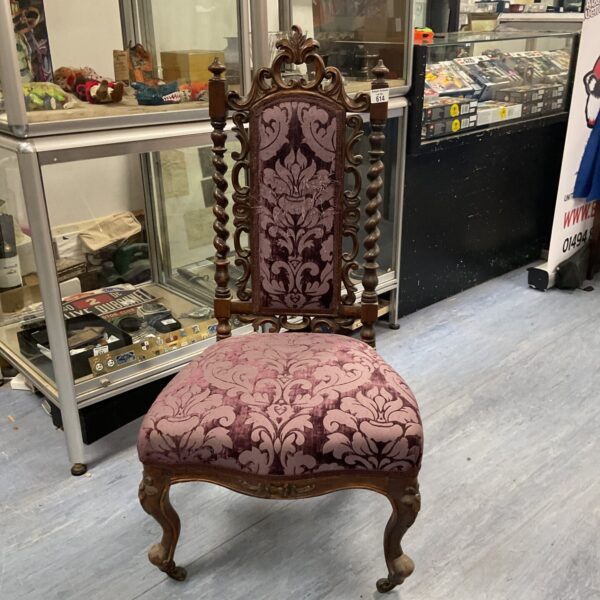 Antique oak barley twist and carved detail nursing chair on bras casters