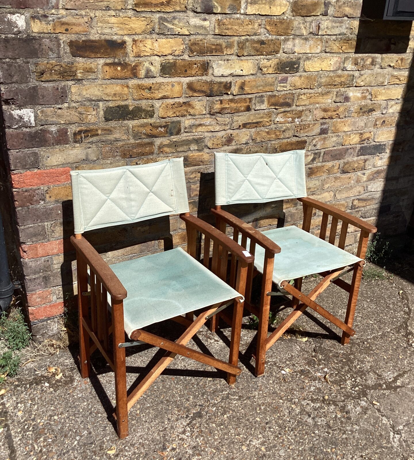 Two folding wooden Garden Chairs