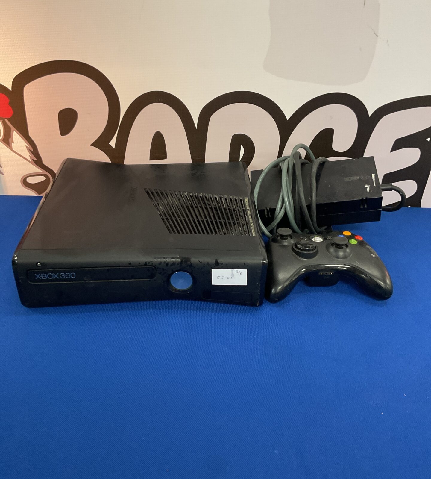 Xbox 360 S console with controller and power supply
