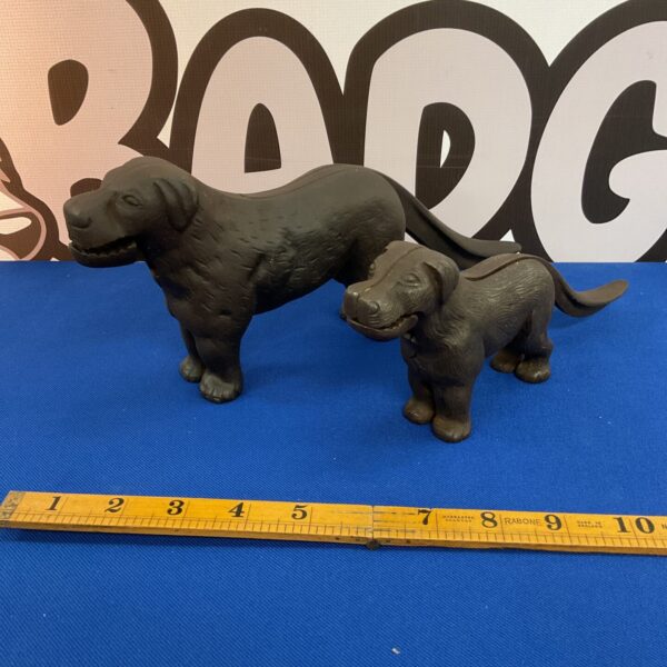 Two vintage cast iron dog nut crackers