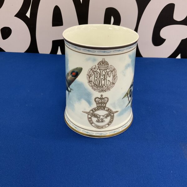 Front view of the Royal Flying Corps commemorative tankard with aircraft design.