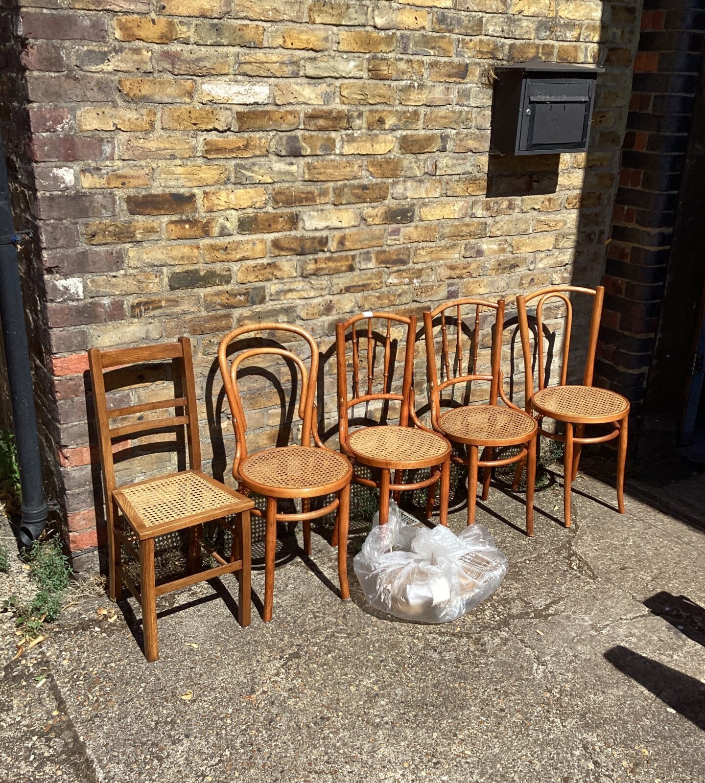 Five Rafia Dining Chairs with spare rafia