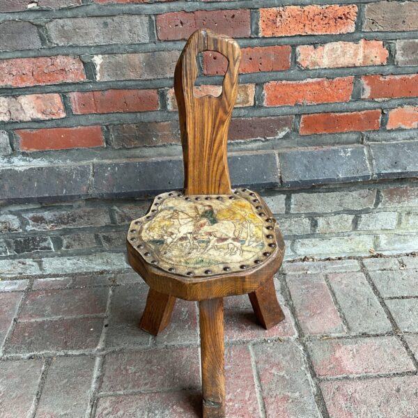 Vintage oak milk maids stool with leather hunt scene seat