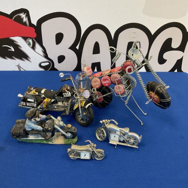 Two tin motorcycles with two royale biker clocks