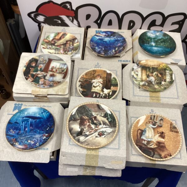 Royal Doulton collectors plates in a mixed lot for display.