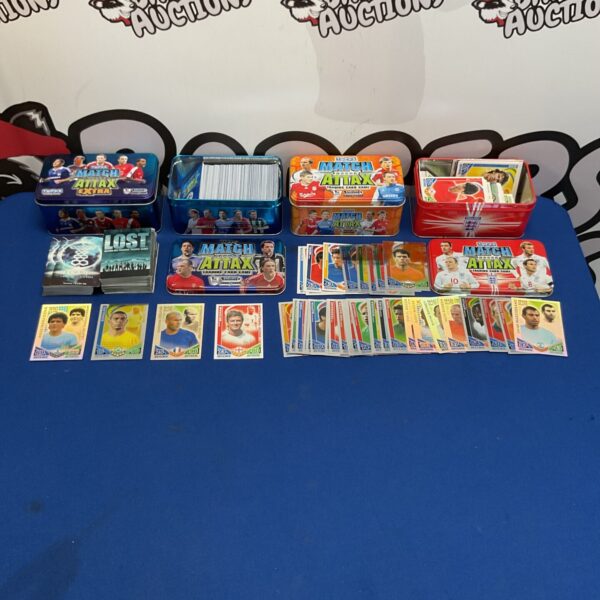 Collection of match attax cards in tins with other cards