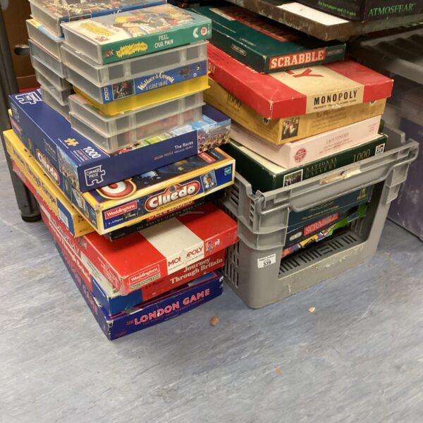 Large quantity of board games and videos