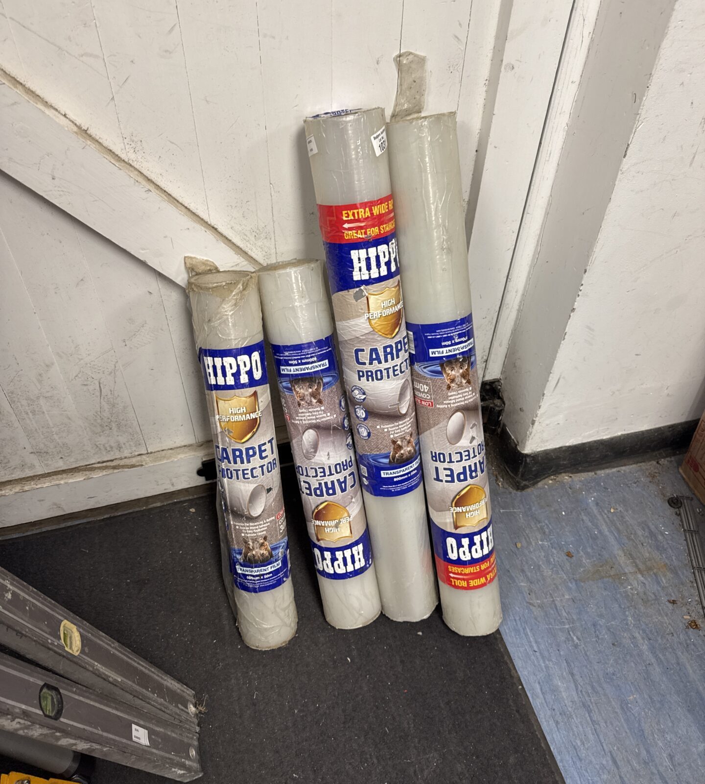 Four rolls of hippo carpet protector