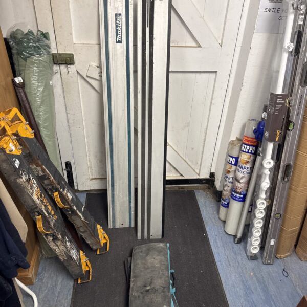 Makita plunge saw guide rails with case, used condition.