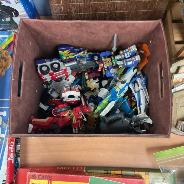 Box of retro transformers toys and vehicles