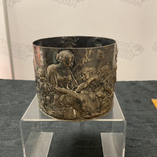 Antique whitemetal cylinder with detailed relief sculpture.