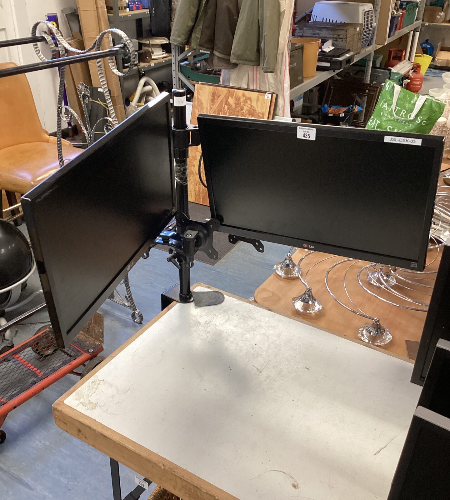 Two LG monitors with desk clamp stand & two dual monitor mounts