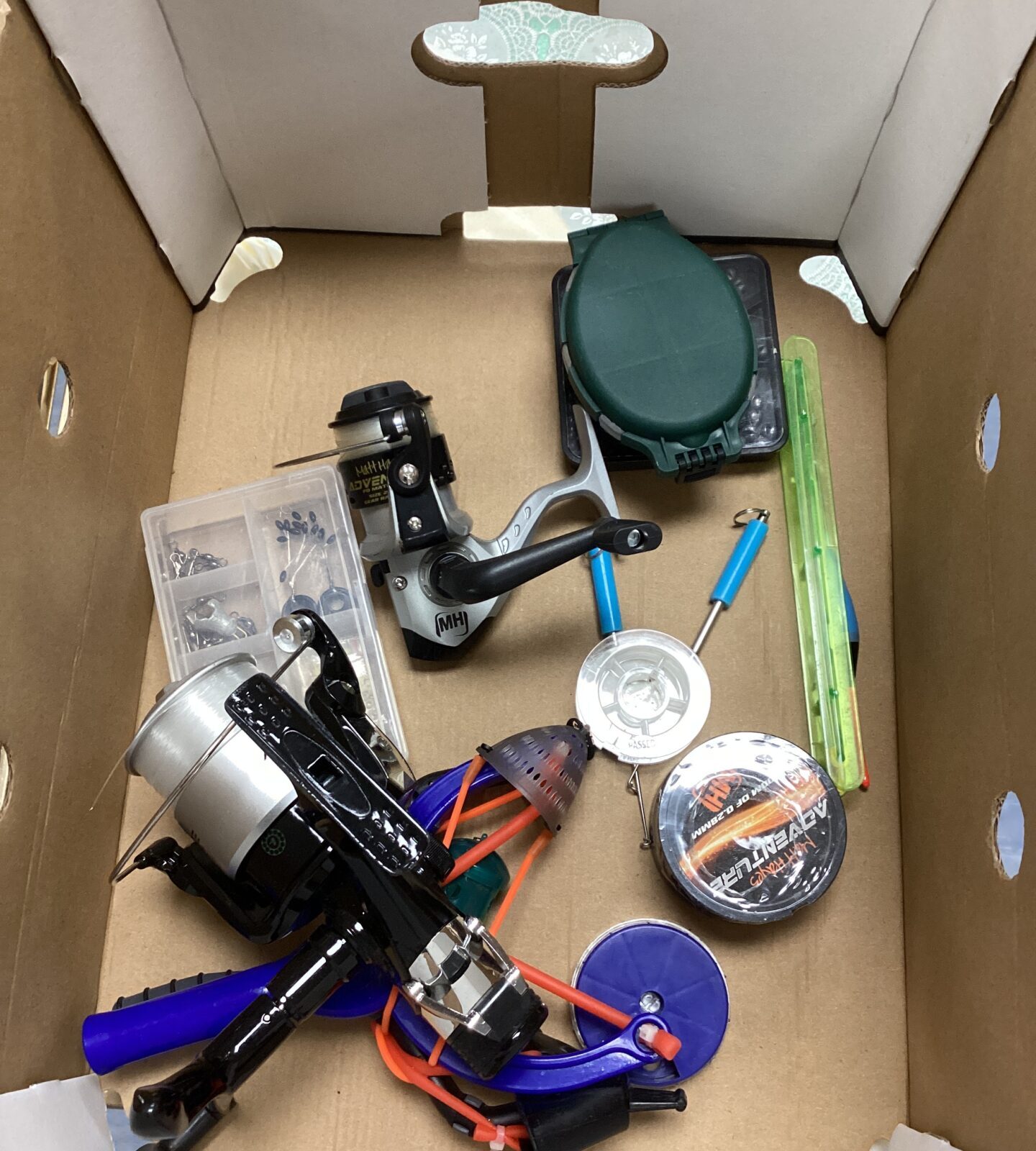 Selection of fishing items inc Two Reels