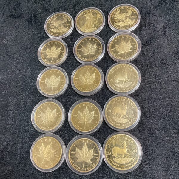 Lot of fifteen reproduction commemorative gold-plated coins.