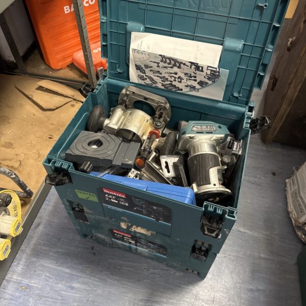Makita XTR01 cordless router in a tool case.
