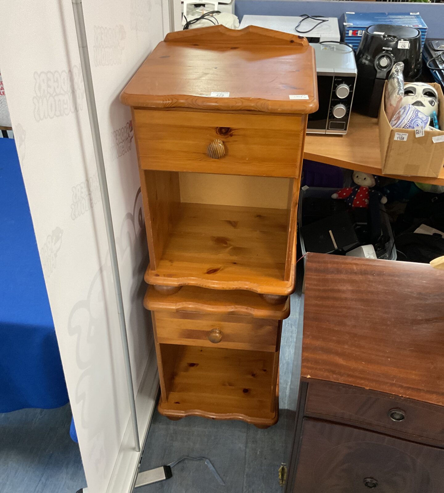 Two pine bedside cabinets