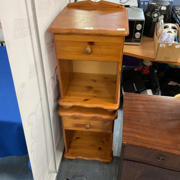 Two pine bedside cabinets