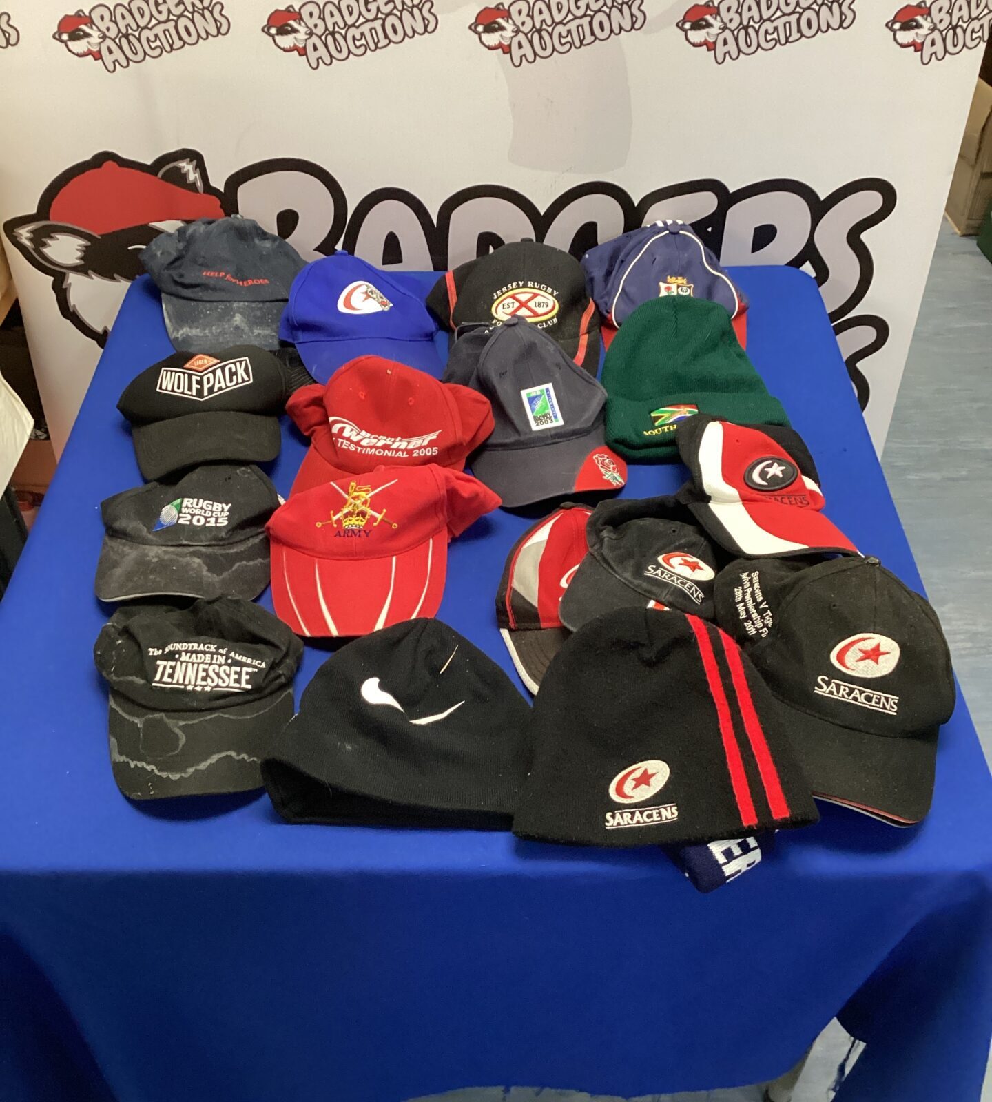 Collection of sports caps & beenies inc nike, saracens, wolf pack & rugby league