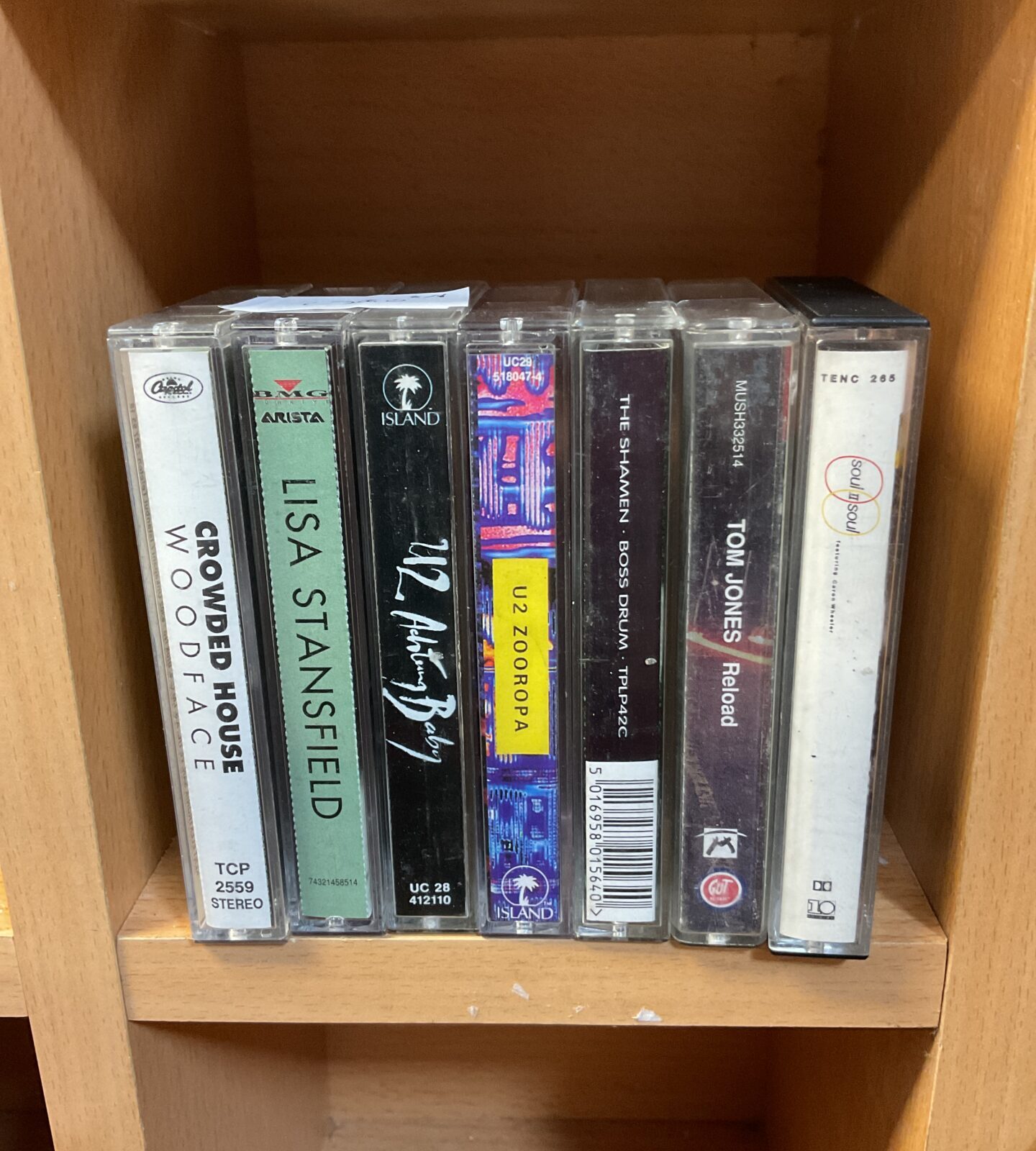 Selection of retro music cassettes including tom jones & u2