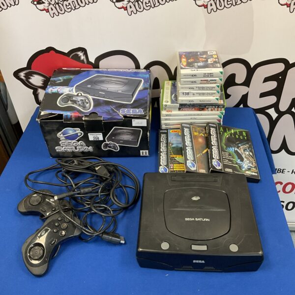 Sega Saturn console boxed with controllers & games