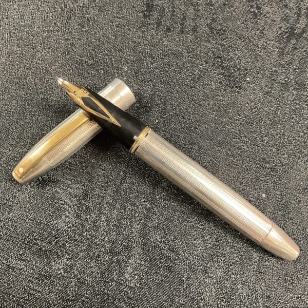 Vintage Sheaffer sterling silver fountain pen with gold nib.