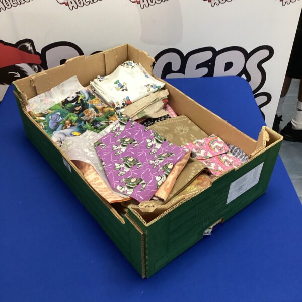 Box of upholsters off cuts of mixed fabrics