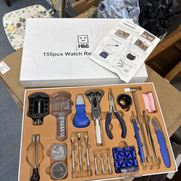 H&S 155-piece watch repair kit with various tools.